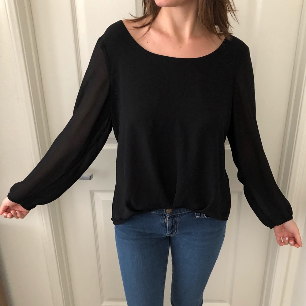 Loose flowy black top with back detail